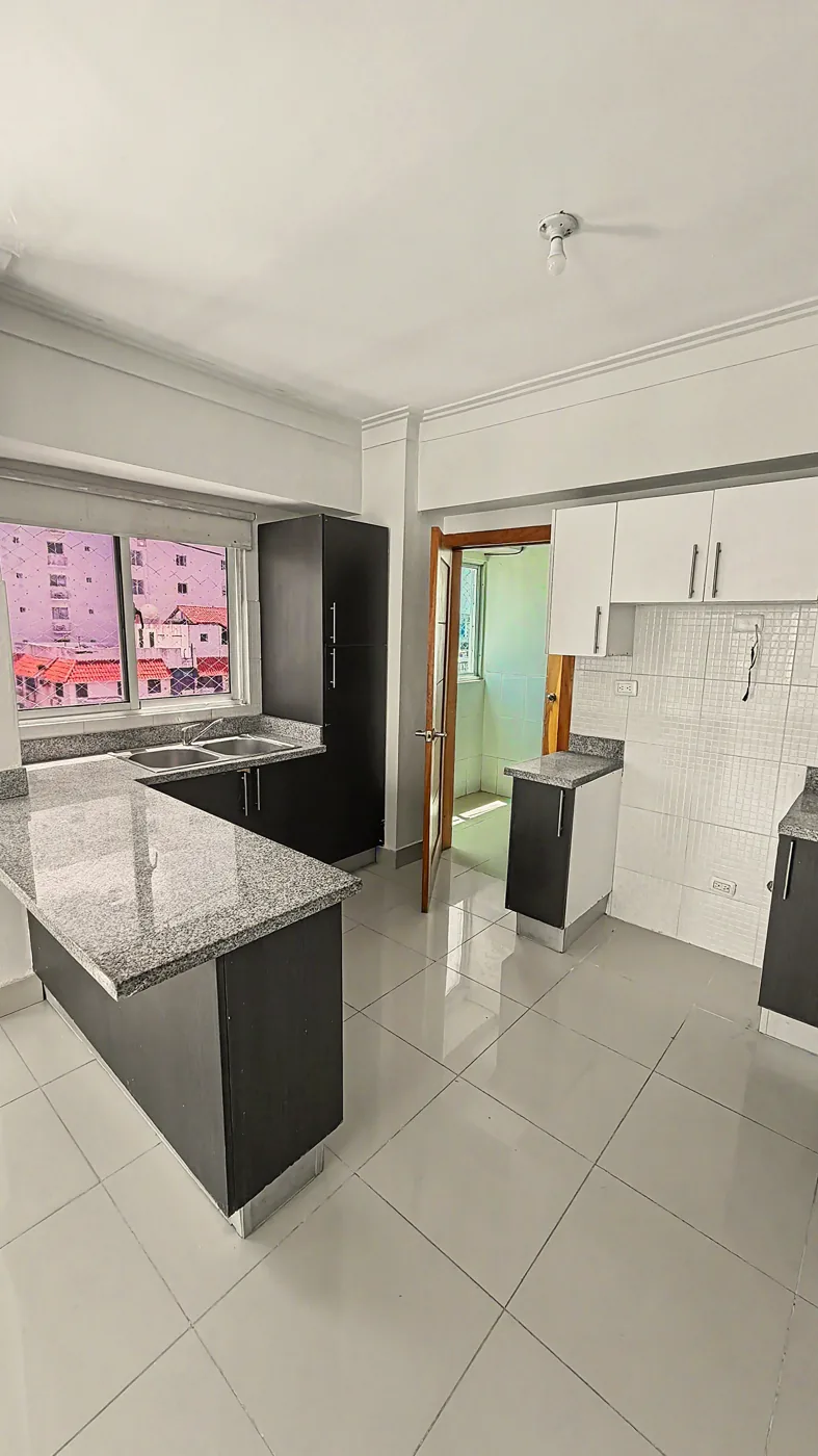 Cocina con isla de granito, mejora fiel